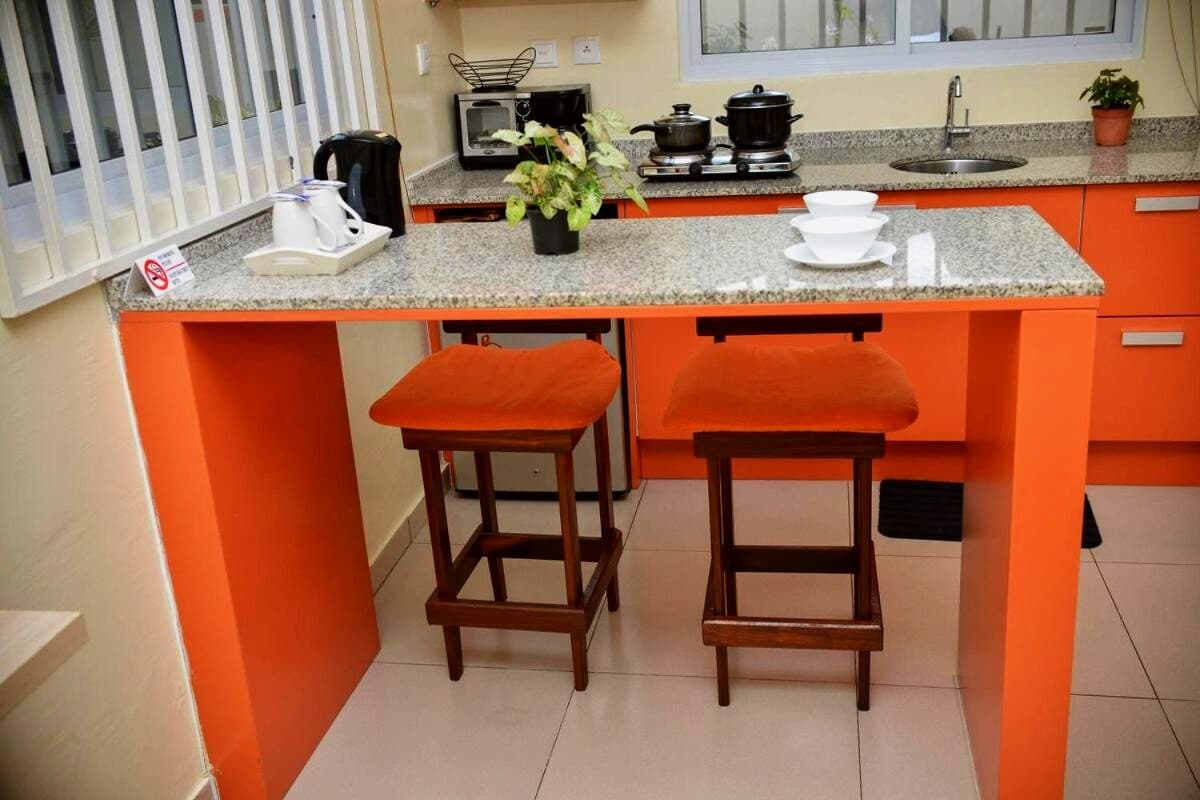 Breakfast bar and stools in an apartment kitchen