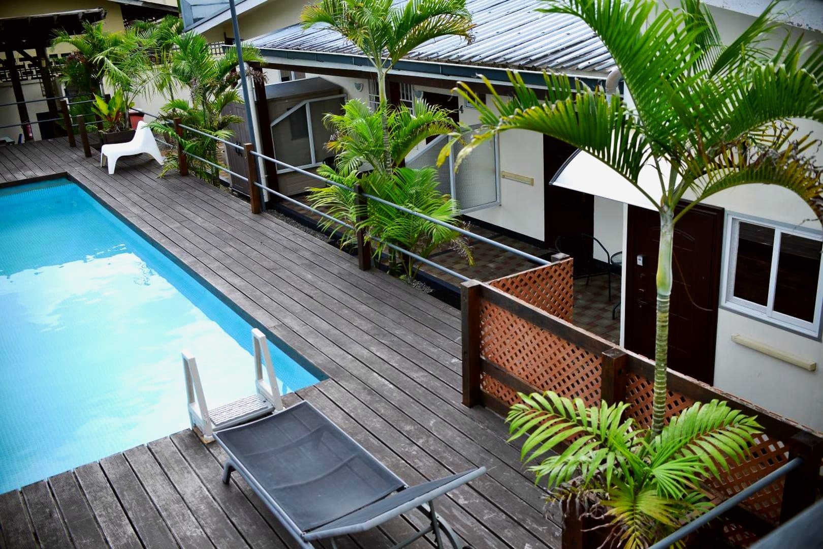 The pool and deck seen from the garden side